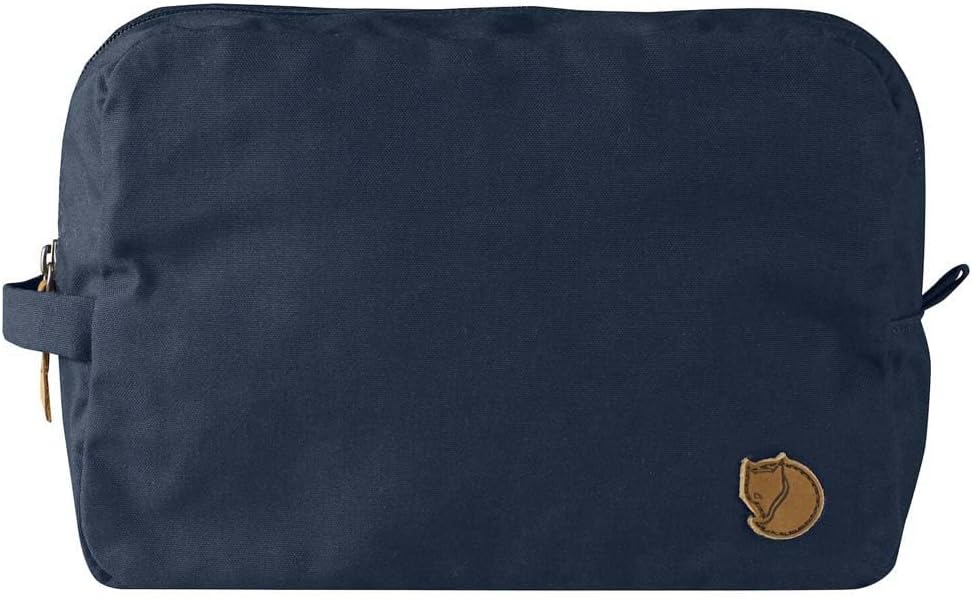 Fjällräven laptop sleeve in Frost Green color on a desk