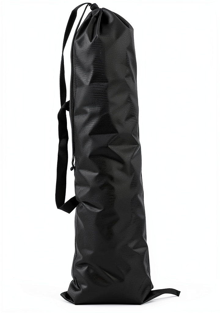 EmmaWu storage bag being packed with a folding chair at a campsite